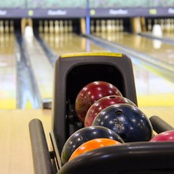 Host a bowl-a-thon as one of your fundraising ideas for adoption fees.