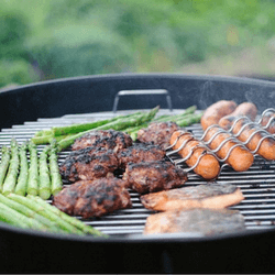 Host a backyard barbecue as a way to fundraise for breast cancer-related cause.