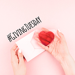Someone holding an envelope and a heart with #GivingTuesday written above them.